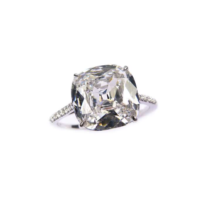 Single stone diamond ring, the cushion cut 5.01ct F VS1 stone four claw set